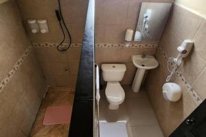 Um banheiro em Casa Tribu - Casa Entera