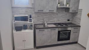 Cucina o angolo cottura di Sa Benedica - Luxury House