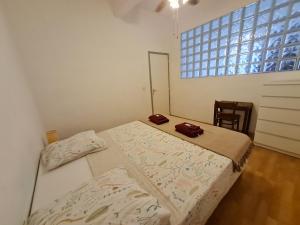 Posteľ alebo postele v izbe v ubytovaní Charming authentic apartment in central location