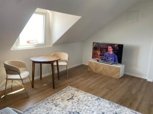 TV/trung tâm giải trí tại Villa de Blue2