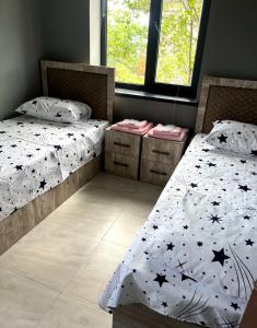 Een bed of bedden in een kamer bij ArtStar