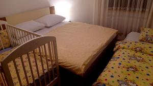 Postel nebo postele na pokoji v ubytování Kuća za odmor Antonio