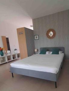 Postel nebo postele na pokoji v ubytování Nice Resort Studio Holidays Family in Palmela