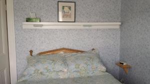 Cama o camas de una habitación en Compass Rose Heritage Inn