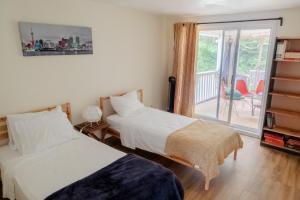 Postel nebo postele na pokoji v ubytování Chalet Mozart