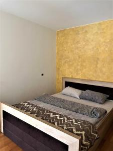 Krevet ili kreveti u jedinici u okviru objekta Apartman Žuti Bor