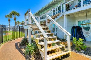 a wooden staircase leading up to a house at Nassau #402 in Rockport