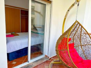 Residence Al Kasaba - Spacious apartment with swimming pool and direct access to sea客房内的一张或多张床位