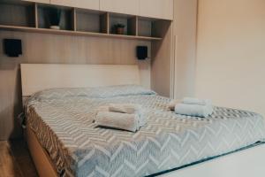 เตียงในห้องที่ Casa Calandri - Appartamento con Terrazza - Free Wi-Fi