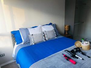 Säng eller sängar i ett rum på Acogedor departamento en Temuco