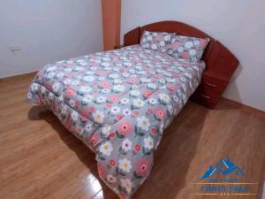 Ein Bett oder Betten in einem Zimmer der Unterkunft Hotel Chota Golf