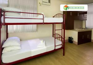 Postel nebo postele na pokoji v ubytování UN Residences