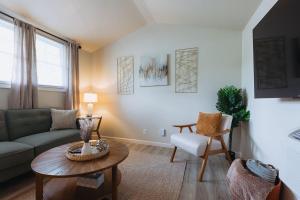 a living room with a couch and a table at Sage Haven #5 in Johnson City