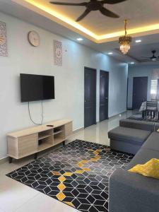 Телевизор и/или развлекательный центр в AF Homestay