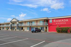 a parking lot in front of a hotel at Ramada by Wyndham Harrisonburg in Harrisonburg