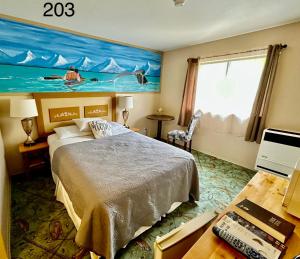 Postel nebo postele na pokoji v ubytování Alaska Angler's Inn