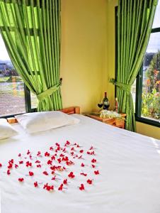 Postel nebo postele na pokoji v ubytování Hotel Cabañas San Cayetano