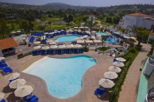 an aerial view of a resort swimming pool with umbrellas at Luxury Villa at Omni La Costa Resort & Spa in Carlsbad