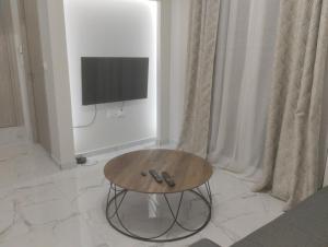 TV a/nebo společenská místnost v ubytování Peggy's Superior Apartment