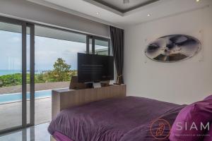 Postel nebo postele na pokoji v ubytování Sunset Villa 4Br Infinity Pool & Sea View