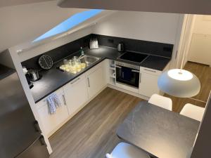 Cuina o zona de cuina de FELIX LIVING 7, modern & cozy, geilste Dachterrasse der Stadt, 6 Schlafzimmer