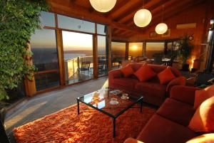 Posezení v ubytování Summit Views Skyview Penthouse + 1 fotografie