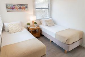 Postel nebo postele na pokoji v ubytování Bella Paradiso