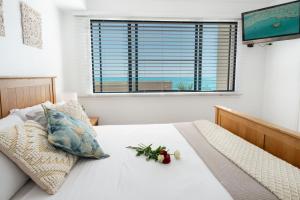 Postel nebo postele na pokoji v ubytování Bella Paradiso + 27 fotografií