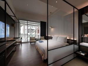 Katil atau katil-katil dalam bilik di Orient Luxury Hotel-Jiaoxi