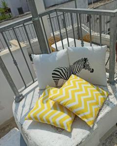 A balcony or terrace at Bianco Sale Holiday Home - Seaview Terraces