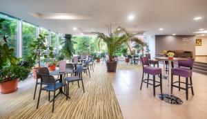 Reštaurácia alebo iné gastronomické zariadenie v ubytovaní Hunguest Hotel Gyula