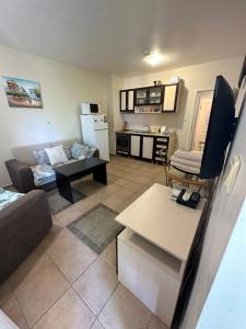 a living room with a couch and a table at Summer Dreams B26 in Sunny Beach