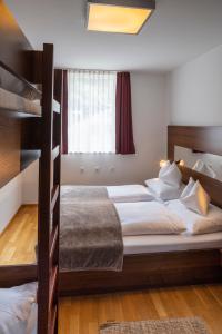 Ένα ή περισσότερα κρεβάτια σε δωμάτιο στο mi_vida - Apartment Bergwies