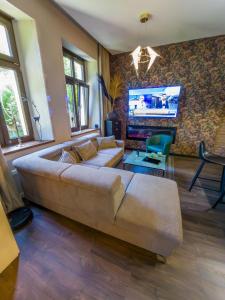 Televízia a/alebo spoločenská miestnosť v ubytovaní LIKE HOME 2 Sauna,Jacuzzi & Spa