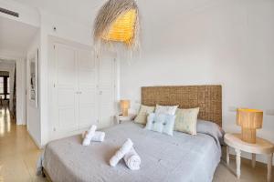 Ein Bett oder Betten in einem Zimmer der Unterkunft Villa Gadea 7-2