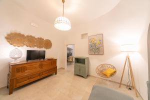 TV o dispositivi per l'intrattenimento presso Trullo Alfieri - Relax e Garden