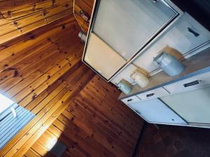 an overhead view of a room with wood floors and a table at Ferienhütte Simon Gregor in Eitweg