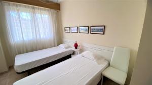 En eller flere senge i et værelse på Puerto Romano VYBDenia + 15 billeder