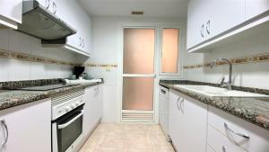 Køkken eller tekøkken på Puerto Romano VYBDenia