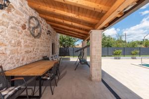 Ein Patio oder anderer Außenbereich in der Unterkunft Villa Maria Tadini
