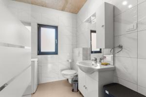 Ein Badezimmer in der Unterkunft Villa Maria Tadini