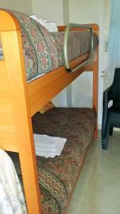 Двох'ярусне ліжко або двоярусні ліжка в номері Sea House Formia