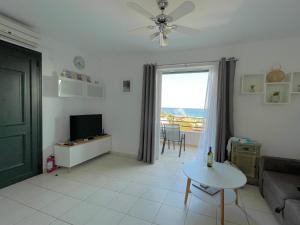 A television and/or entertainment centre at Bluview, Glyfada, Corfu