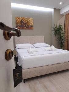 薩蘭達的住宿－Vila Marjana，卧室配有一张床