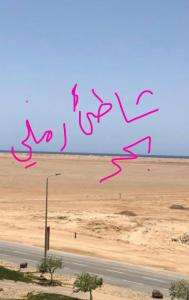a picture of a sign that says pray in the desert at شقة ثلاث غرف ,للعائلات فقط ,Sunrise Sunset1 in King Abdullah Economic City