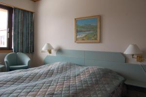 Postel nebo postele na pokoji v ubytování Eikum Hotel + 22 fotografií