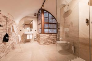 Ein Badezimmer in der Unterkunft H5 Grauer Bär Studios & More