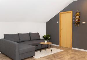 Posezení v ubytování Zona Optimizma accommodation & SPA