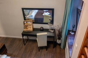Televízia a/alebo spoločenská miestnosť v ubytovaní LIKE HOME 2 Sauna,Jacuzzi & Spa