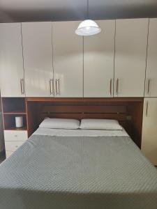 A bed or beds in a room at Marconi House Még 17 kép